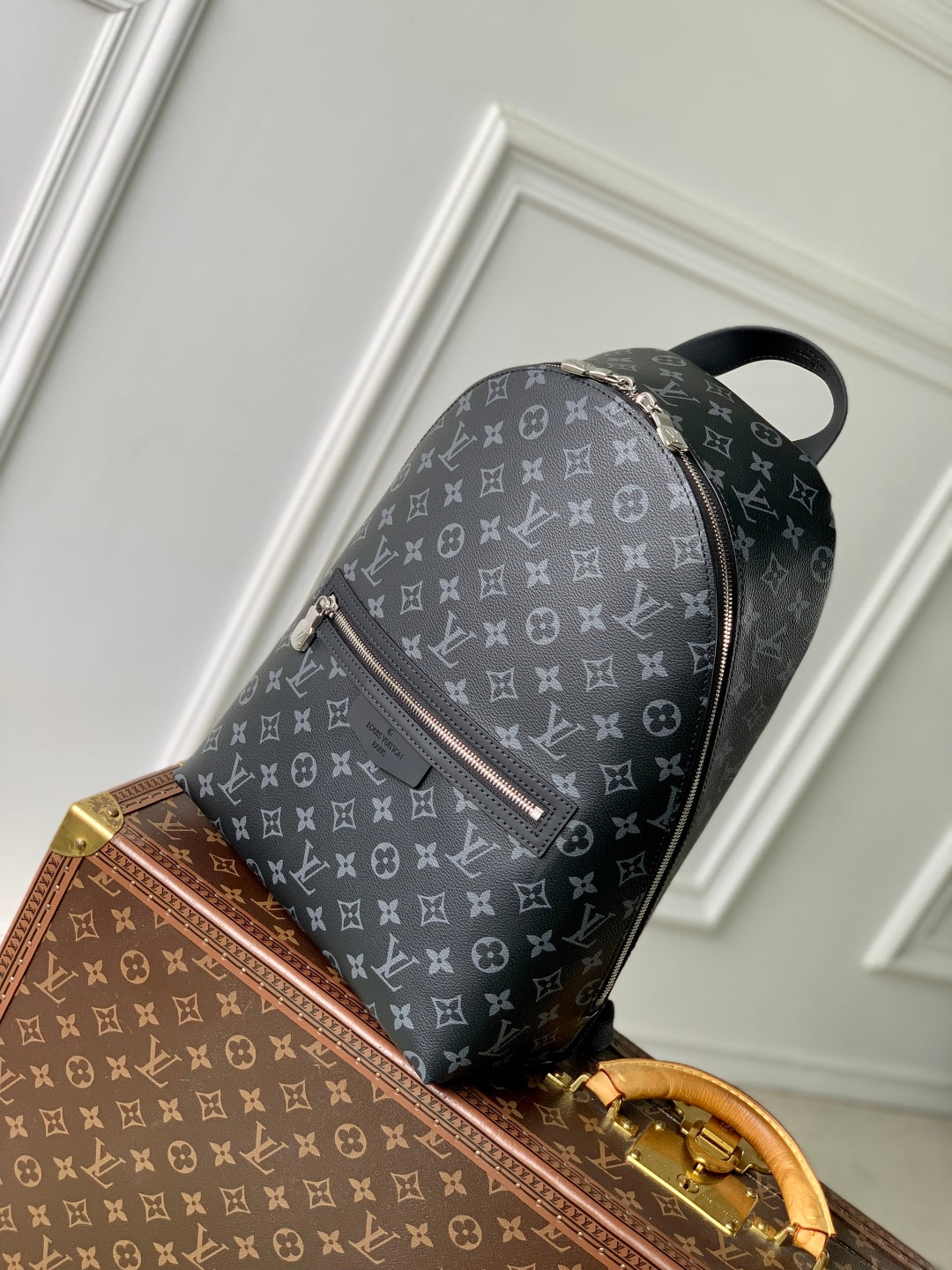 DISCOVERY SLIM BACKPACK 38 IN BLACK MONOGRAM ECLIPSE COATED CALFSKIN