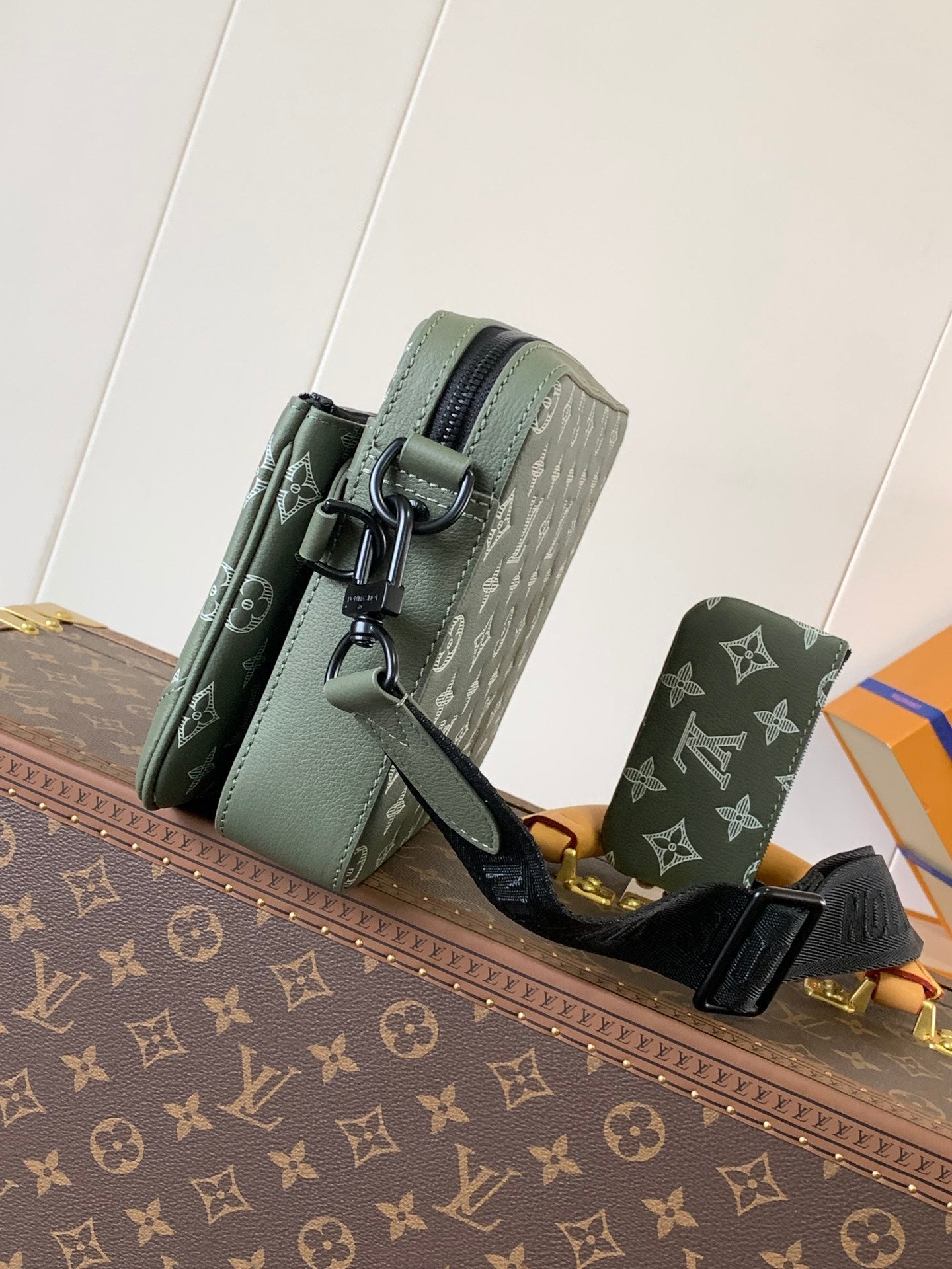 TRIO MESSENGER BAG 25 IN GREEN MONOGRAM SHADOW CALFSKIN
